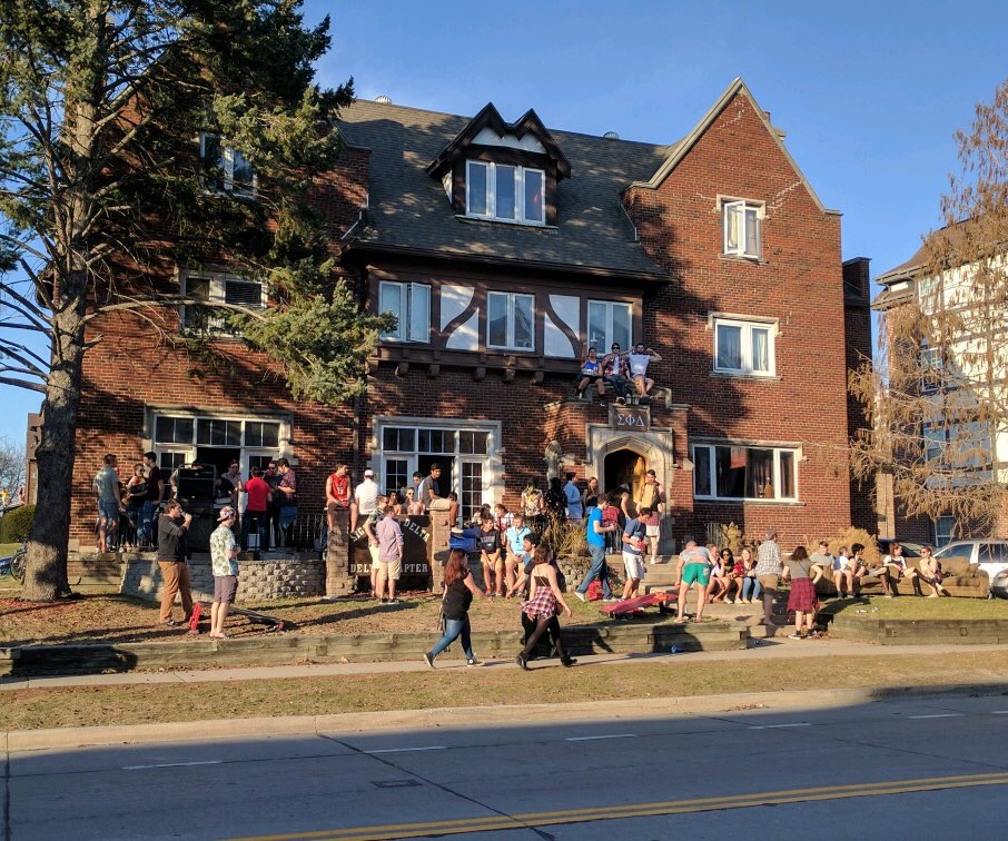 Sigma Phi Delta brothers participating in a campus philanthropy event